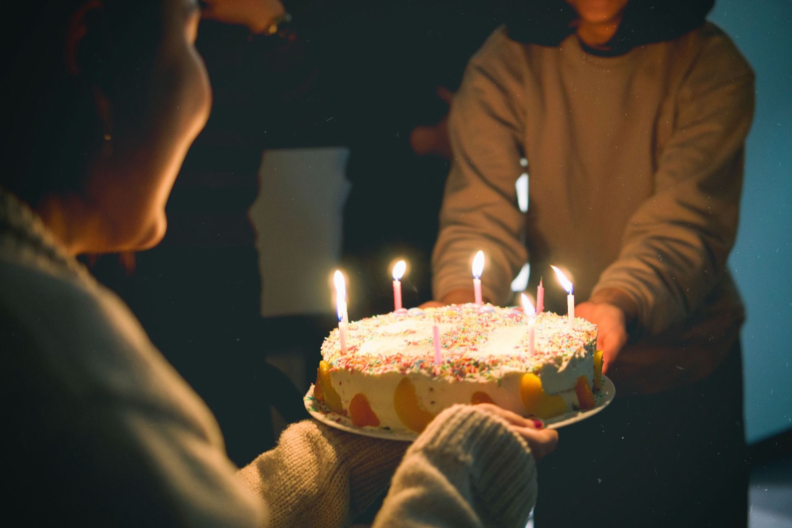 Birthday cake with lit candles